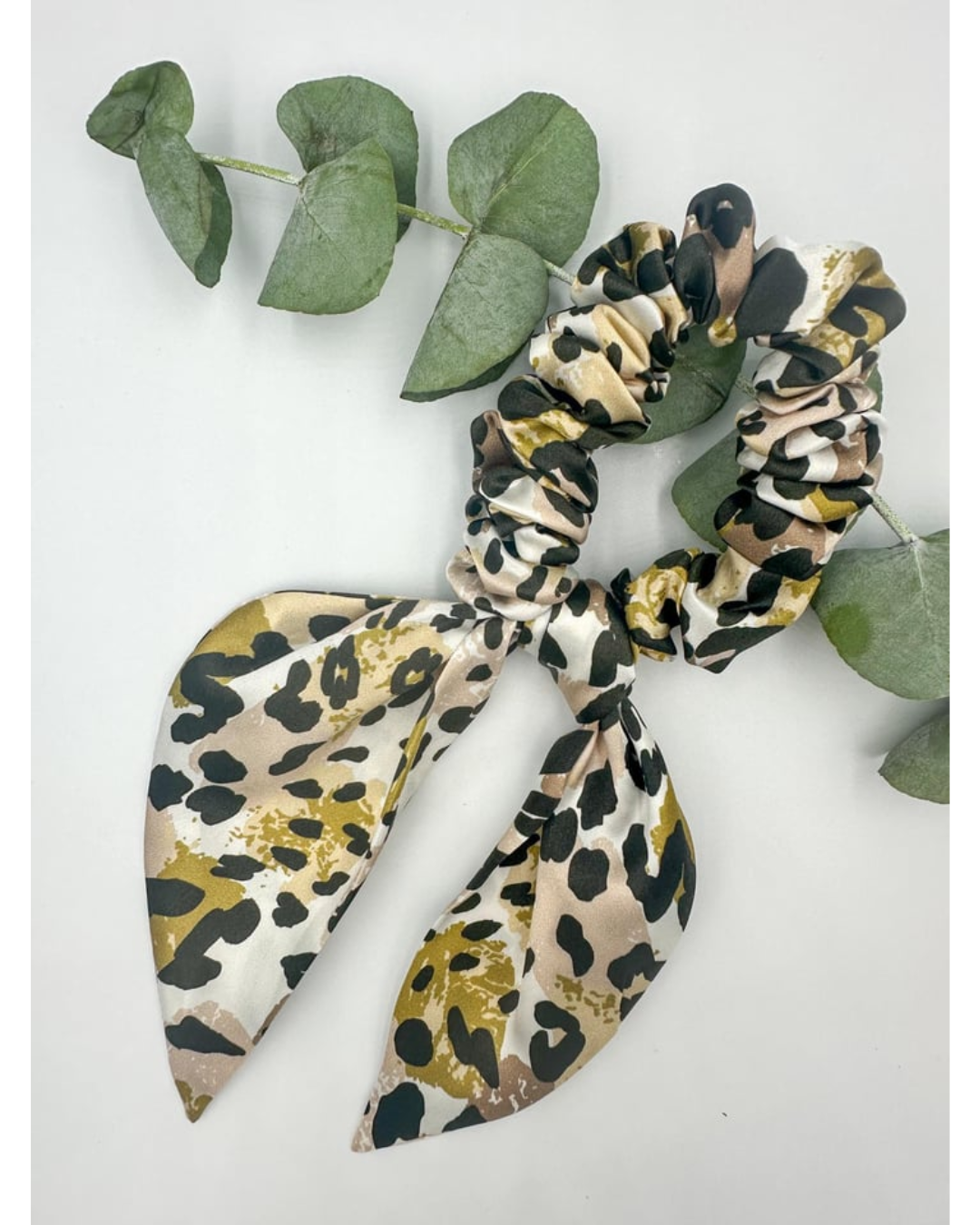 SILK BOW PONYTAIL HOLDER - CORAL LEOPARD PRINT