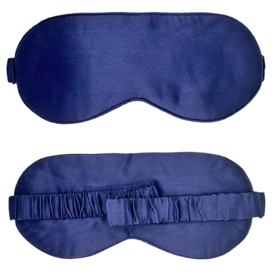 Antifaz para dormir de seda morera color azul marino visto de frente con banda elástica