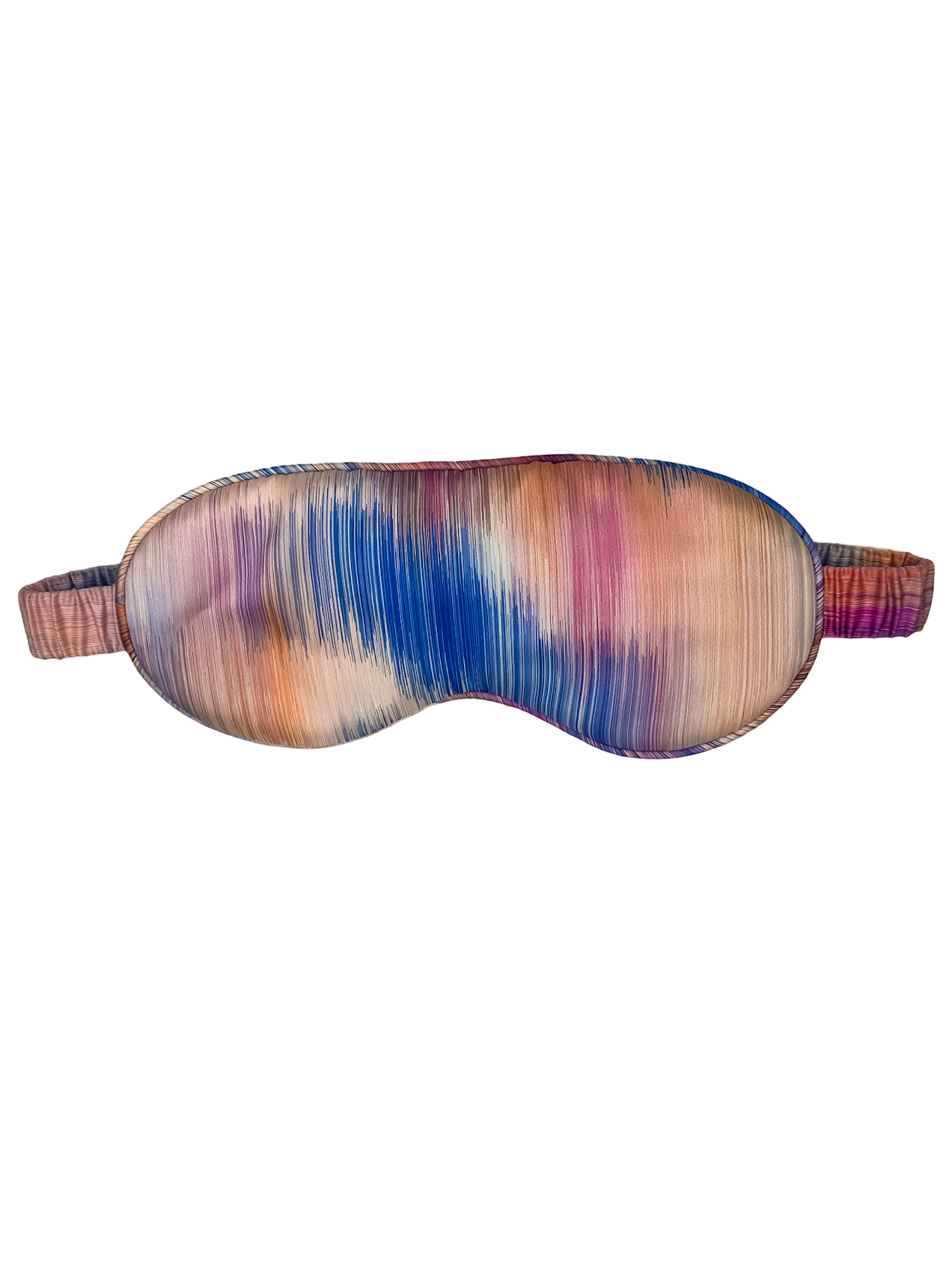 Antifaz para dormir de seda morera con estampado efecto amanecer multicolor, visto de frente sobre fondo blanco