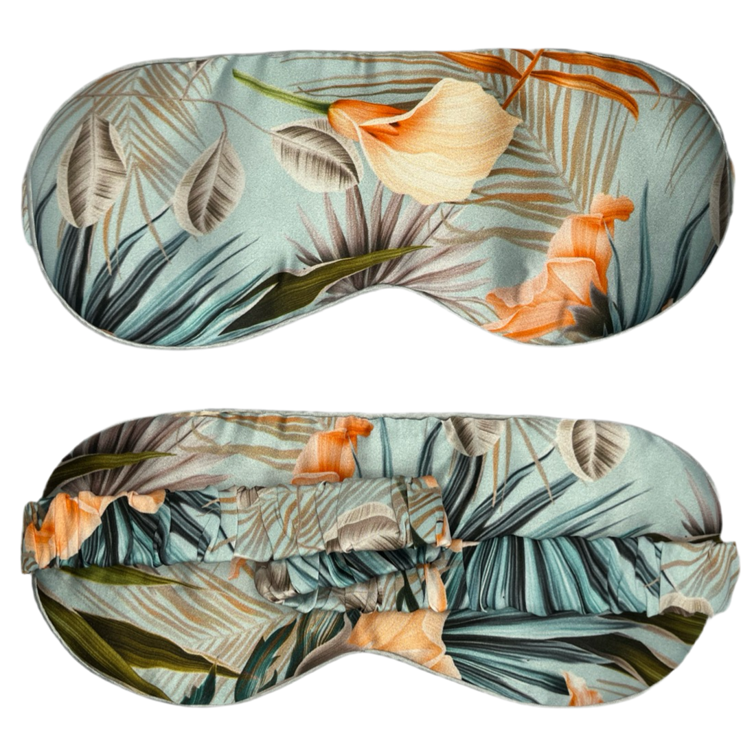 Antifaz para dormir de seda morera con estampado tropical, vista frontal y trasera con banda elástica