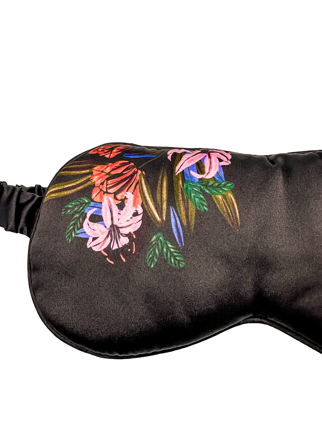 Detalle del estampado floral del antifaz para dormir de seda de morera marrón oscuro