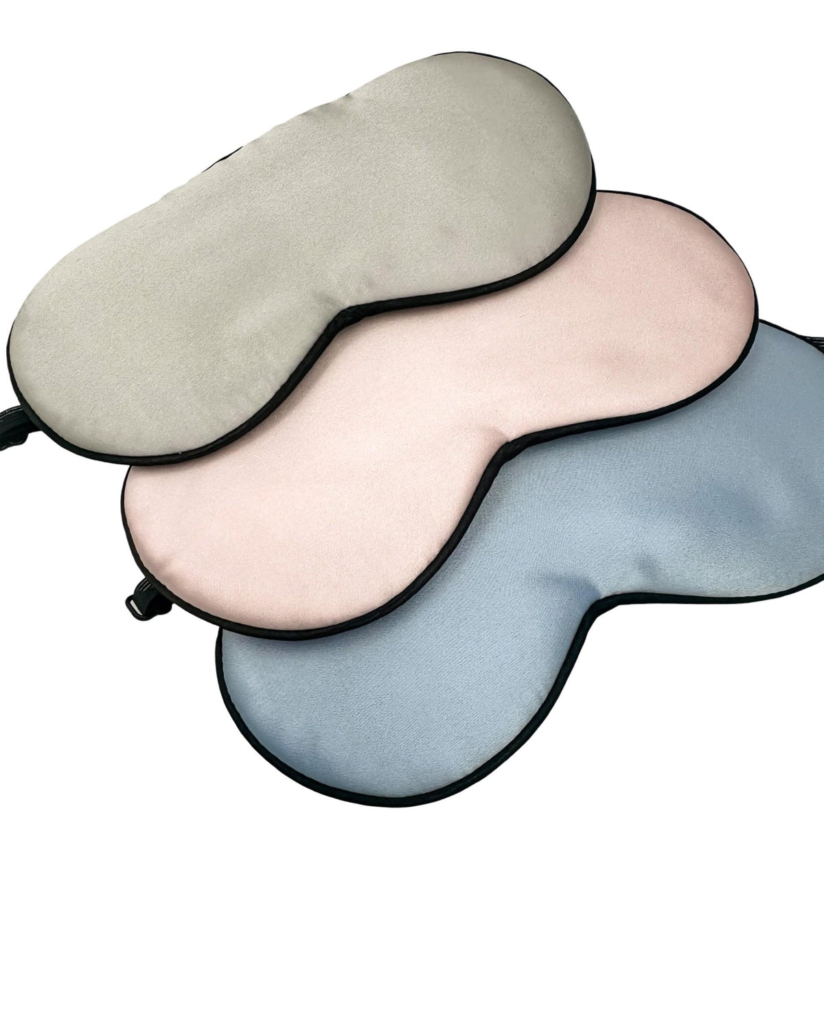 Antifaces de seda para niños en gris, rosa y azul sobre fondo blanco