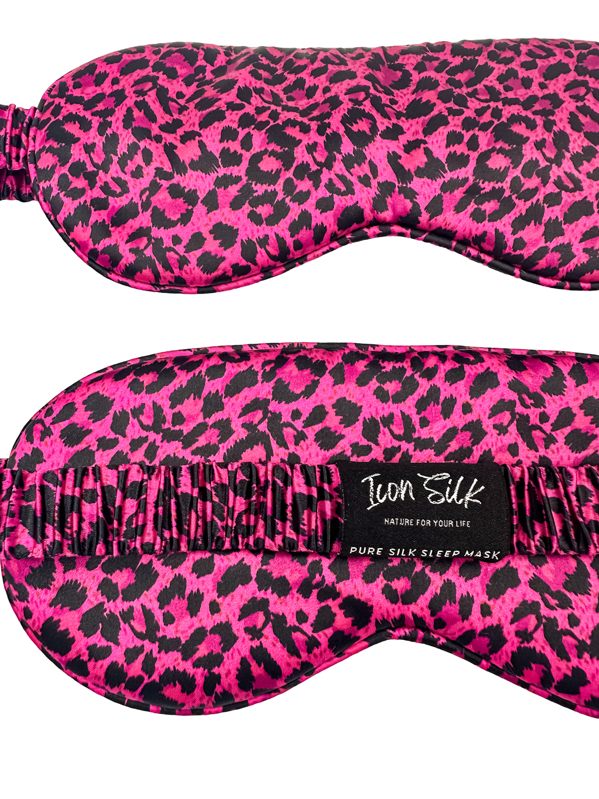 Antifaz para dormir de seda morera con estampado de leopardo rosa y negro, vista frontal y trasera con banda elástica