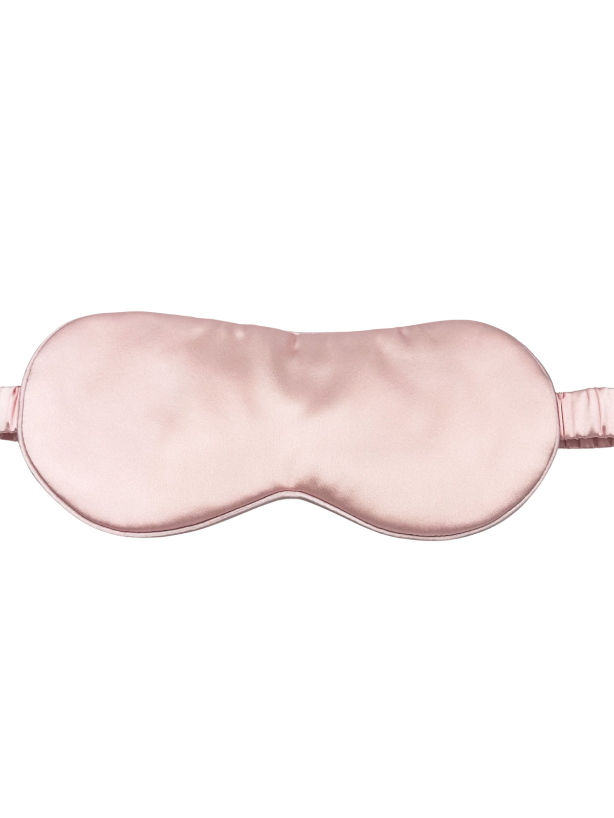 Antifaz para dormir de seda rosa palo visto de frente